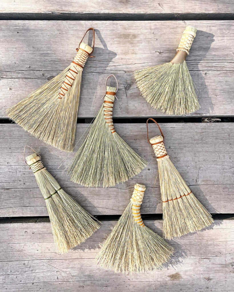 Brooms made by artist Lin Elkins. Making classes offered this summer.