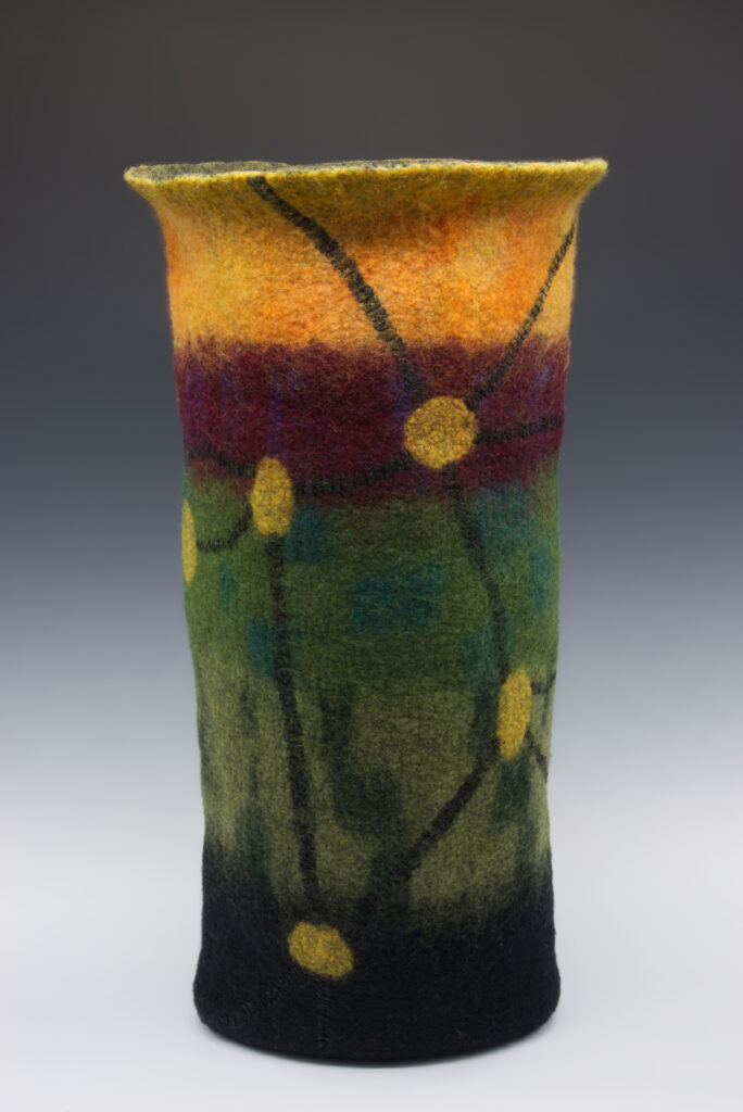Colorful wool vase made my Judy Daniels.