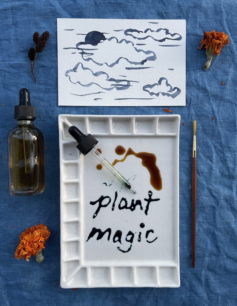 "Plant magic" painted on a palette
