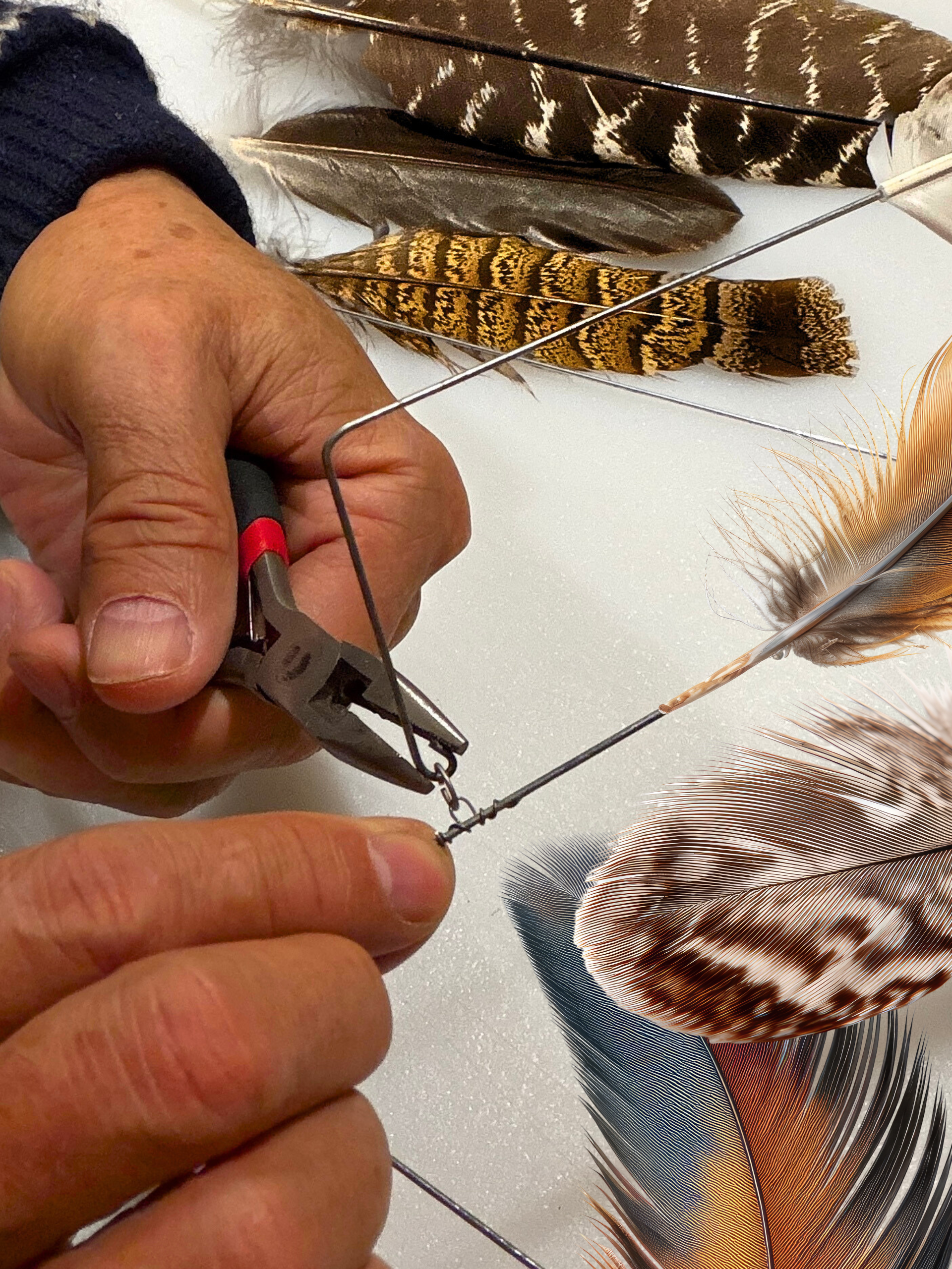 Hands creating Kinetic Sculpture for Touchstone Retreat