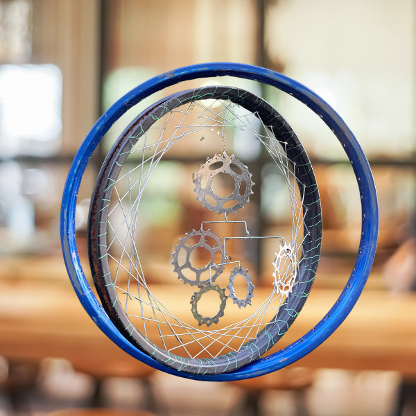 Bicycle gear kinetic sculpture by Chris Toy teaching at Fiber College Touchstones Retreat