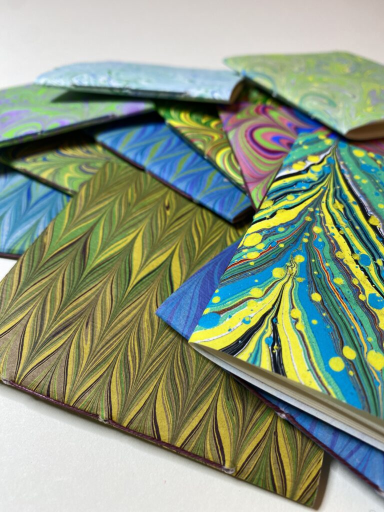 Marbled books by Shannon Kerner for Touchstones Retreat workshop